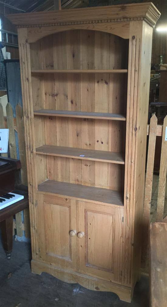 Pine open bookcase with 2 doors under